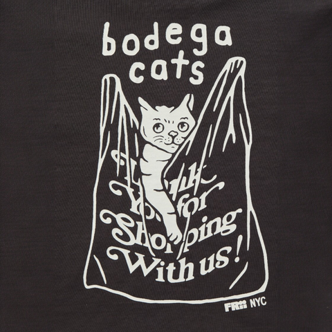 Black long sleeve t shirt with white graphic of a bodega cat in a shopping bag and text 'bodega cats' on a black background.
