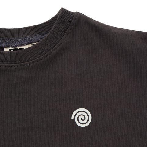 Black long sleeve t shirt with a white spiral logo on a white background