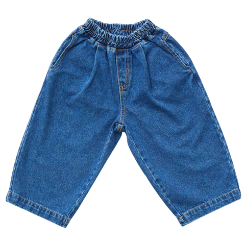 Blue denim pants on a white background